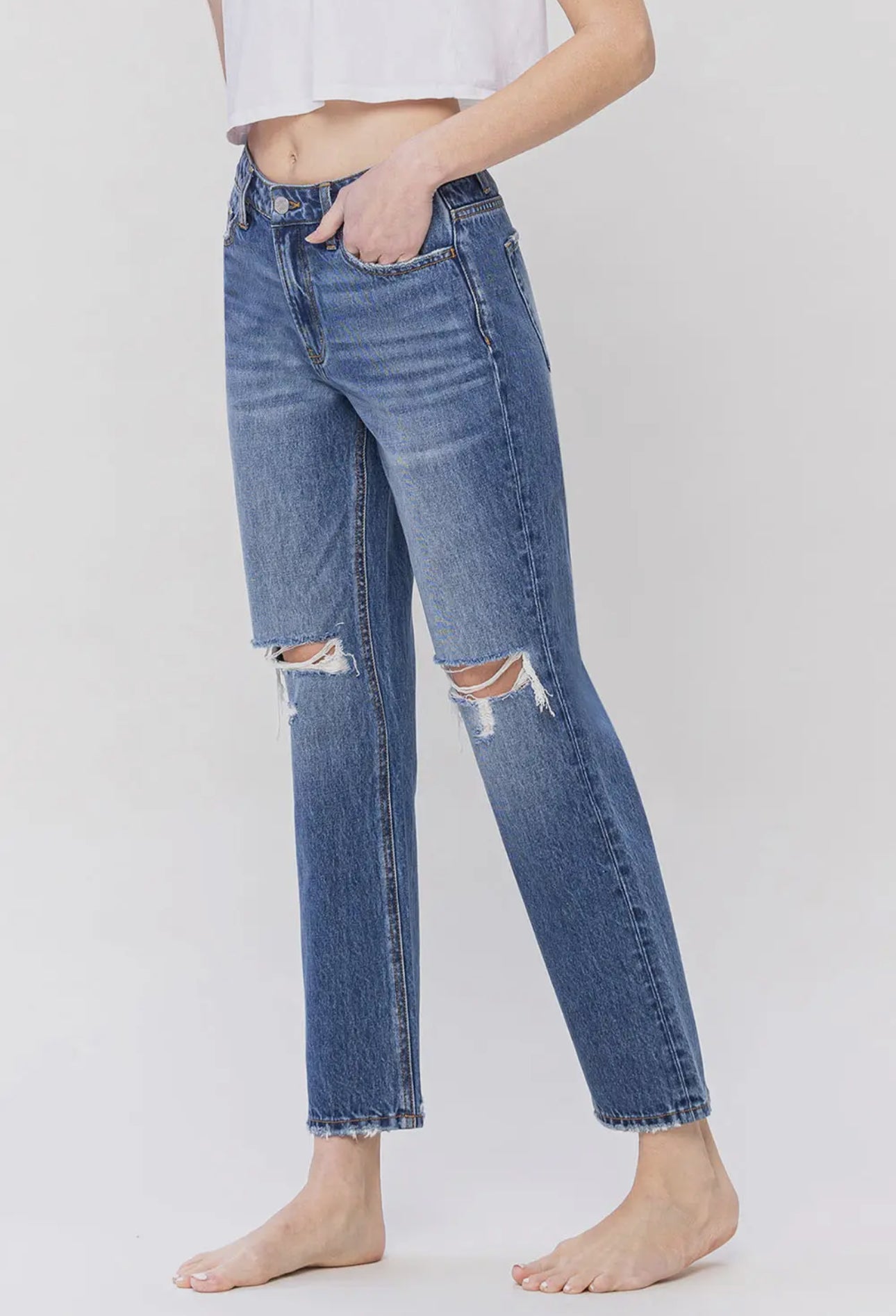 Inviolate High Rise Ankle Jeans