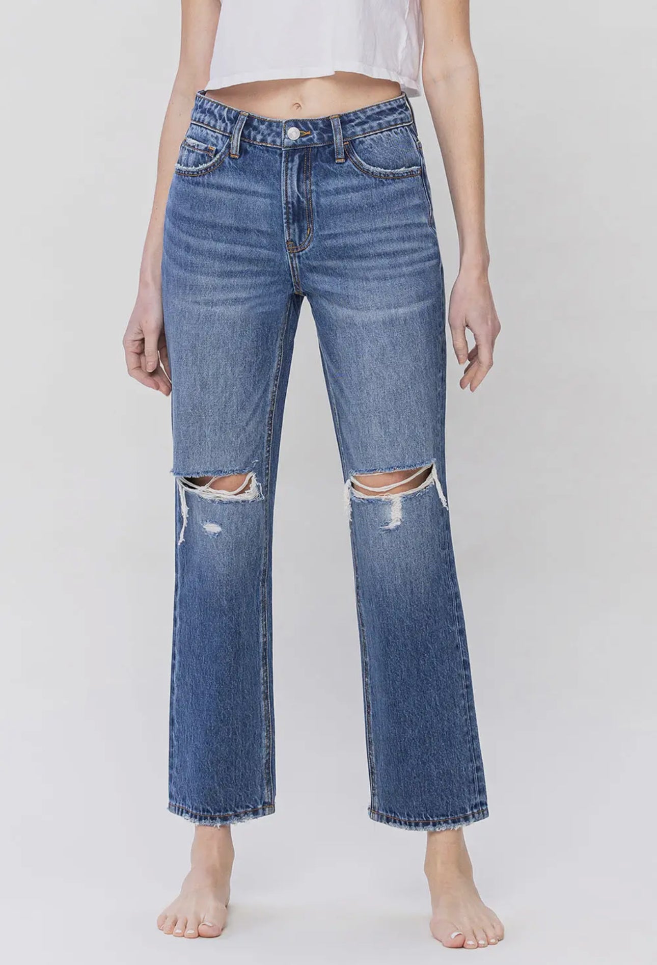 Inviolate High Rise Ankle Jeans